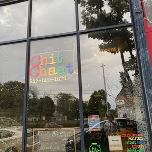 a sign in the window of a restaurant