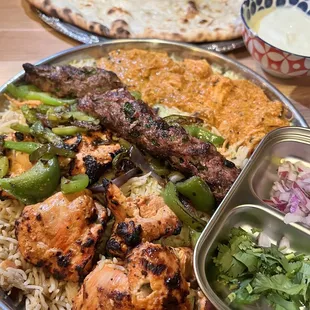 This is the platter for 2! This meal consisted of the Chicken Tikka Masala, lamb kabob, Chicken biriyani and a garlic naan.