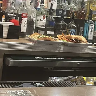 Food placed on the side of the bar instead of ran to the guest.