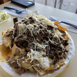 The nacho supreme is huge..way too much for 1 person