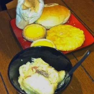 Bland sticky rice, bland egg tarts, bland almond cookie, bland sponge cake, and decent coconut bun.