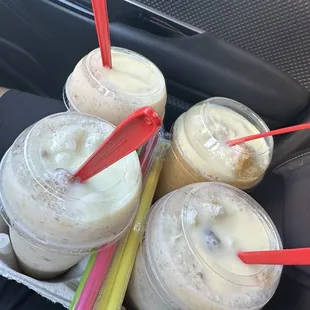 Nuez with coco raspado and Vanilla raspado topped with lechera (condensed milk)