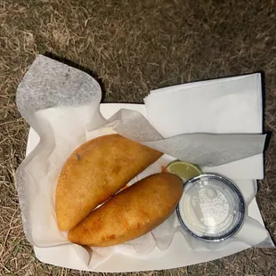 a basket of fried food on the ground