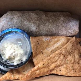 Buffalo chicken wrap with chips and hummus! So good!
