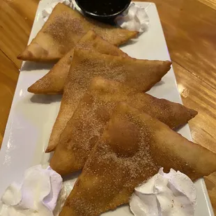 Soapapillas with cinnamon sugar instead of powdered sugar and honey on the side