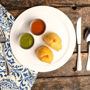 a plate of food on a wooden table