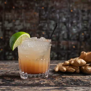 a cocktail with ginger and lime