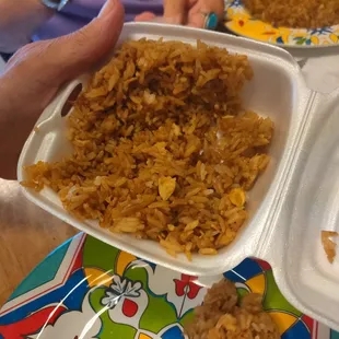 Parents fried rice on the side of their large orange chicken, not pictured.