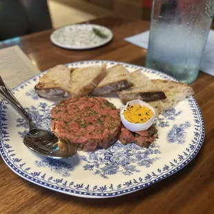 Steak tartare: rustic yet delicious. Although not nearly enough bread.