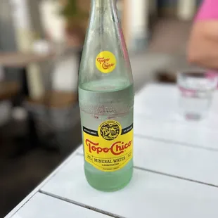 a bottle of soda on a table