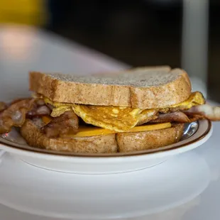 a breakfast sandwich on a plate