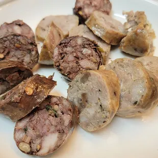 a plate of pork and potatoes