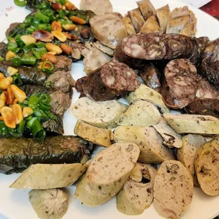 a plate of meat and vegetables
