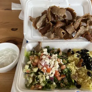 Lamb Bowl (lamb, tzatziki, tabbouleh, yellow rice, black beans, cucumber salad &amp; feta!