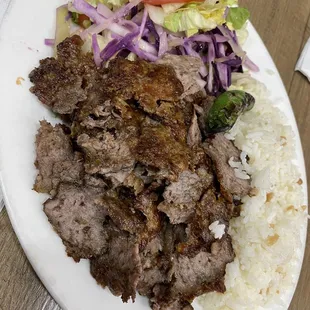 Lunch special doner sandwich with rice and salad; nice crispy bits that go well with the rice. Preferred that over the bread. Great deal