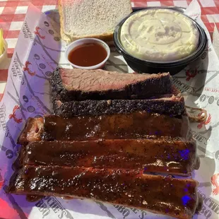 a plate of ribs and sides