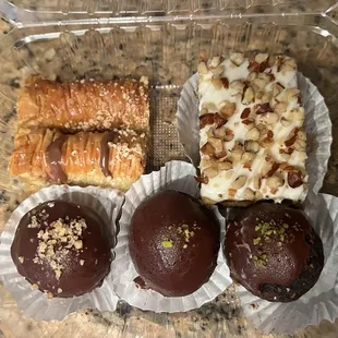 Walnut baklava, hazelnut baklava, carrot cake, walnut and pistachio rum balls