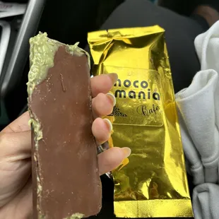 Dubai bar straight out of the package leaving the shop. It wasnt put into a bag or anything to damage it, so it must've came like this.