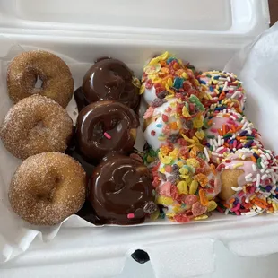 Cinnamon, chocolate glazed, fruity pebbles and sprinkles