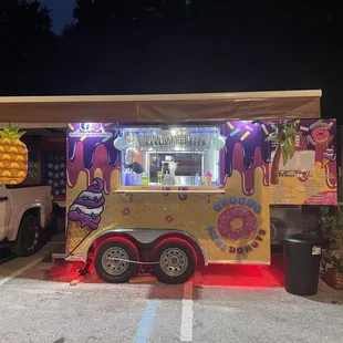 a food truck in a parking lot