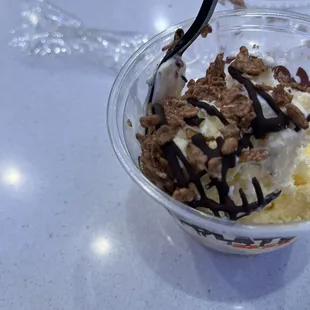 a bowl of ice cream and nuts