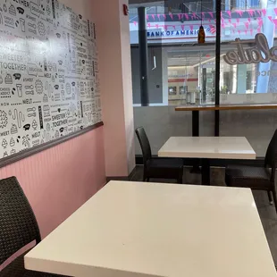 a table and chairs in a restaurant