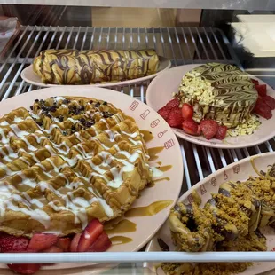 a variety of desserts on plates