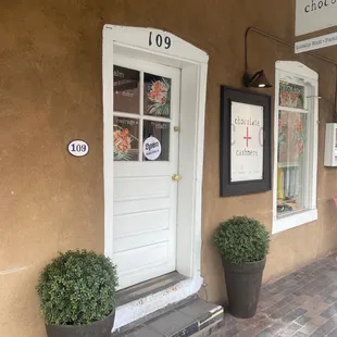 the entrance to a chocolate shop