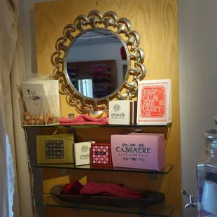a mirror and a shelf of candy