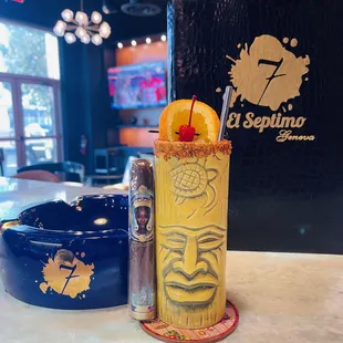 a tiki with orange garnish