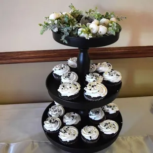 three tiered cupcakes with white frosting