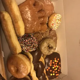 a variety of donuts in a box