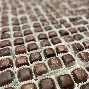 We do small to large orders! This is over 2,000 sea salt caramels for a wedding!