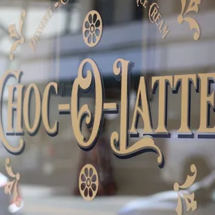 a close up of a sign in a store window