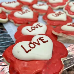 red and white heart cookies with white icing