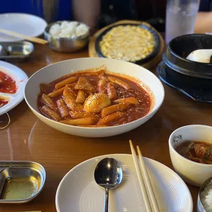 Rice and fish cake with a hard boiled egg Cheese corn  Kimchi stew