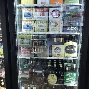 a selection of beer in a refrigerator