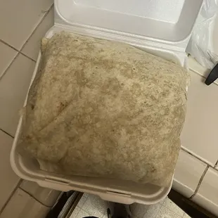 Supreme Burrito that fills up the whole container! AND IT IS DELICIOUS!