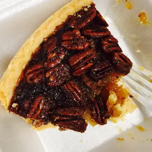 Half eaten pecan pie to-go. If you&apos;re thinking about it-do it! It&apos;s delicious! Best I&apos;ve had in a while.