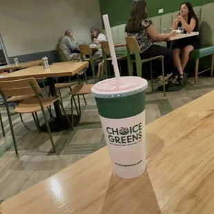 a starbucks cup on a table
