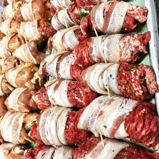 Beef &amp; Chicken diablos stuffed with cheese, jalapeños &amp; wrapped in bacon!