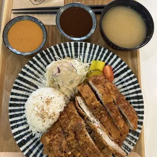 a plate of food on a tray