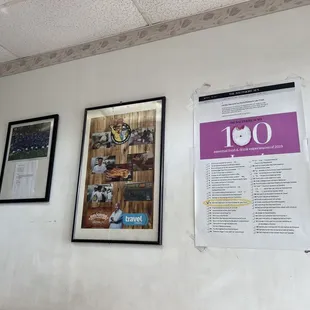 a number of posters on the wall