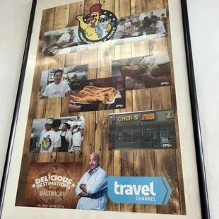 a picture of a man standing in front of a poster