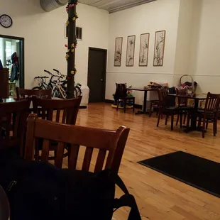 a dining room with tables and chairs