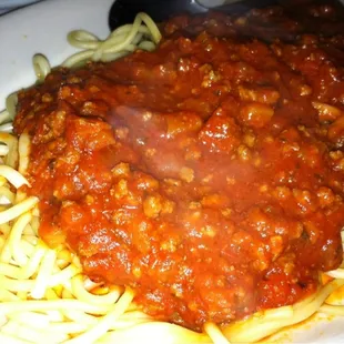 a plate of spaghetti and meat sauce
