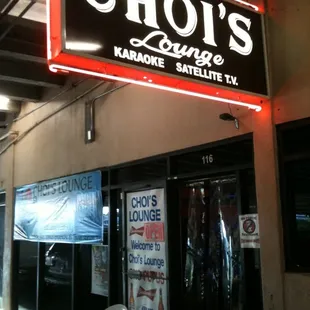 a neon sign for a restaurant