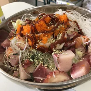 Hwe da bap.  Not sure if i spelled it right.  You mix it up with there special kochujang.