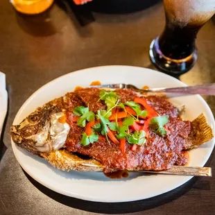 a whole fish on a plate