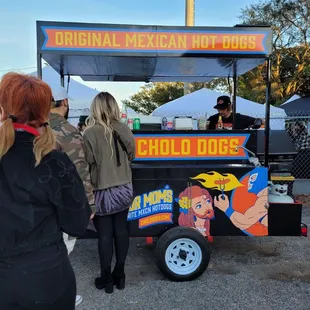 a mexican hot dog cart